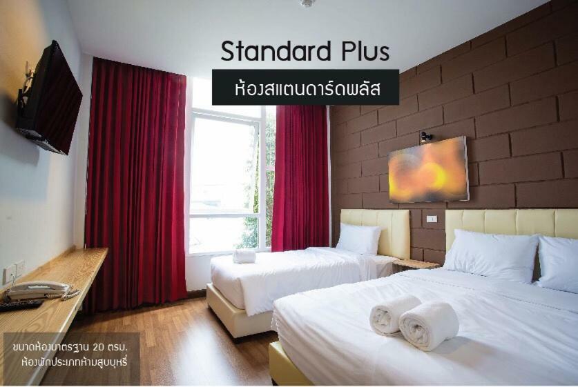 The Zell Hotel Buriram Buitenkant foto